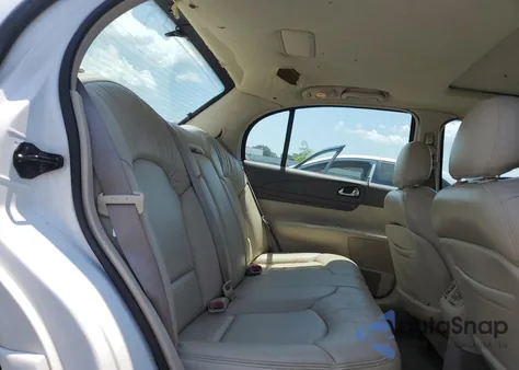 2002 Lincoln Continental из США, поврежденный, VIN 1LNHM97V12Y659007